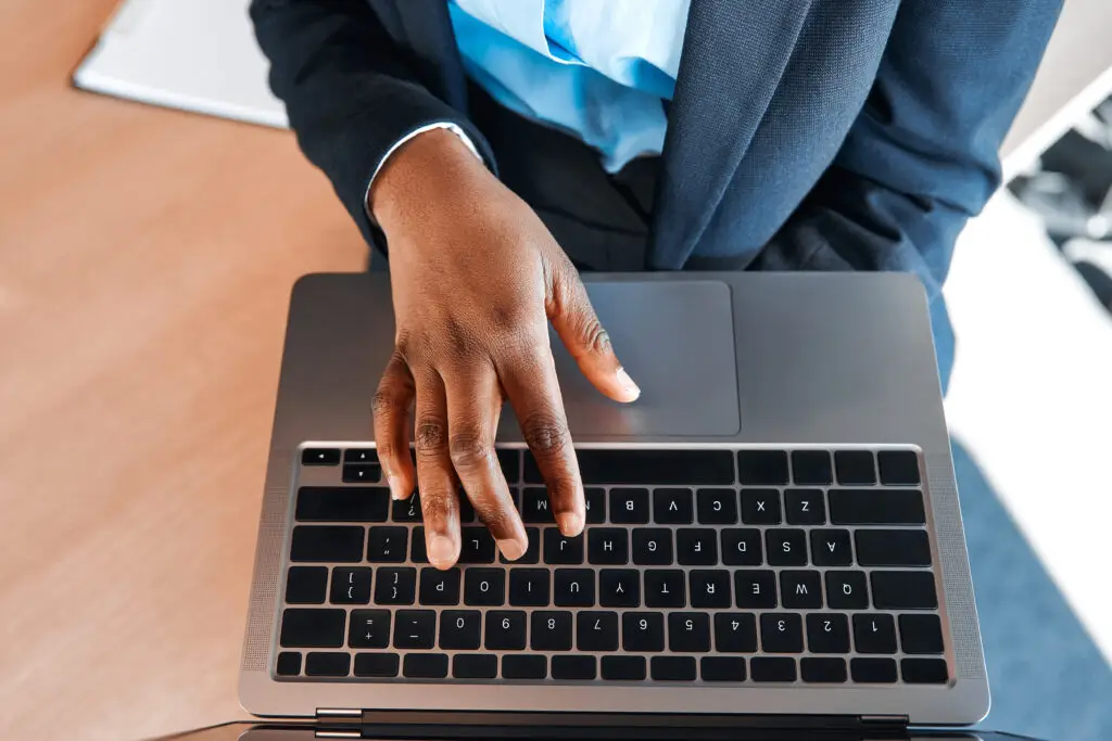 Man at computer figuring if it's time to update his website