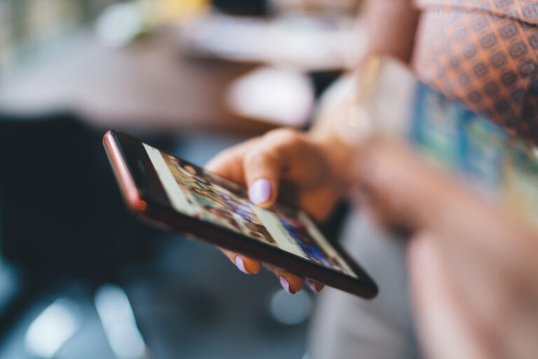 Women using phone and why On-Page SEO matters