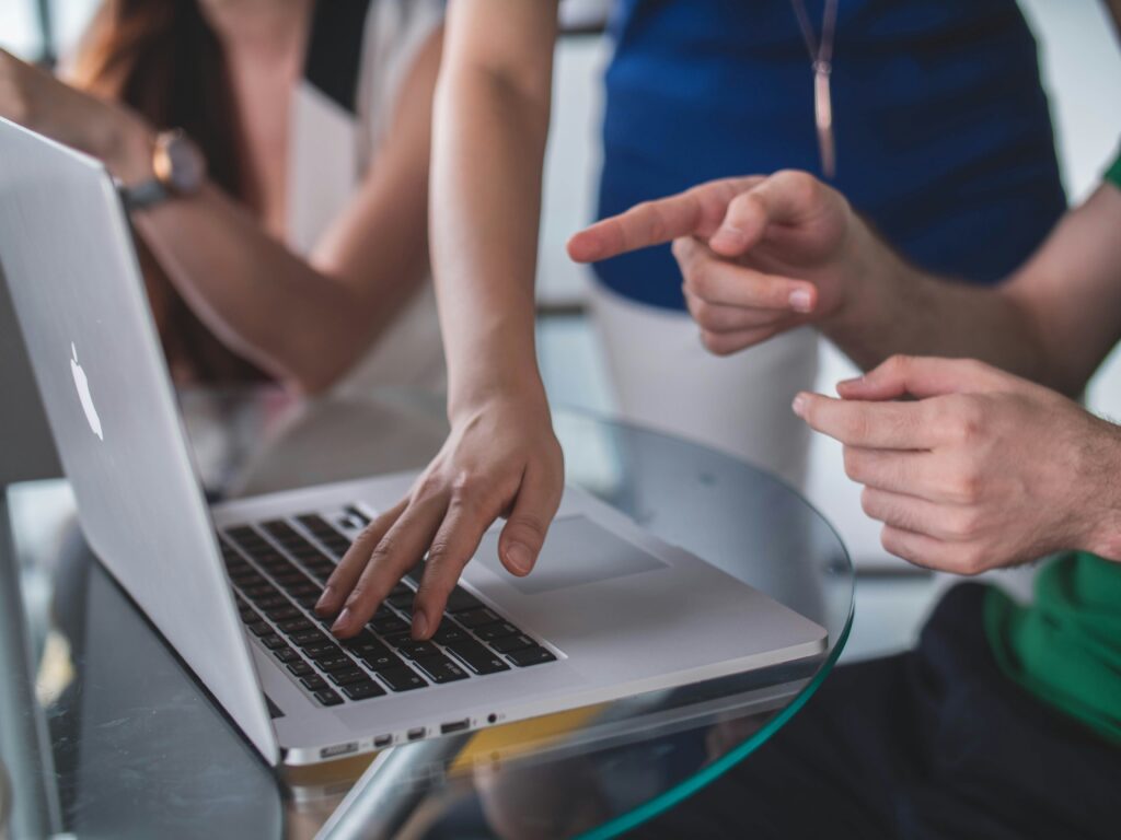 A group of people trying to figure how to grow their business with digital marketing.