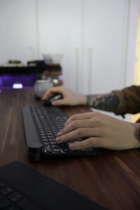 Person setting up their digital marketing campaign.