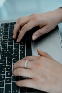 Person on computer working on SEO for their website.